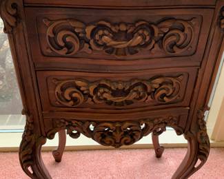 Pair of carved end tables with marble top