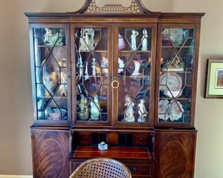 Breakfront in the formal living room, dilled with antique porcelain