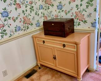 Peach colored server, silver chest