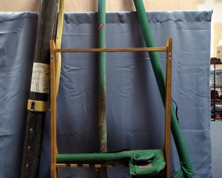 Wall Hanging Fishing Pole Rack, Holds 8 Rods, And Empty Fishing Pole Cases, Qty 7, Materials Include Metal, Canvas, Plastic, And More