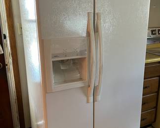 Whirlpool side-by-side fridge/freezer with ice/water dispenser