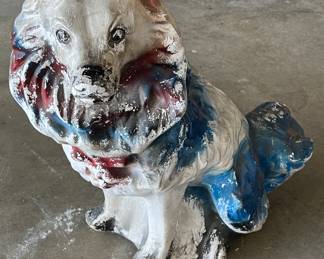 Plaster dog statue
