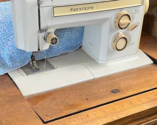 Kenmore sewing machine in cabinet