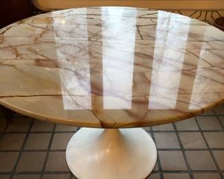 Tulip table with beautiful stone top about 5' to 6' in diameter