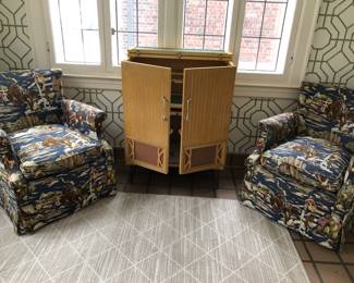 A pair of bark cloth Cowboy chairs