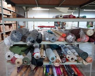 Rolls of Fabric On Shelving Unit Shelves Not Included