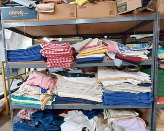 Shelving Unit Contents of Linens and Fabric Scraps
