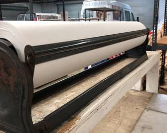 Heavy Duty Roll Paper Cutter with Partial Roll of White Paper