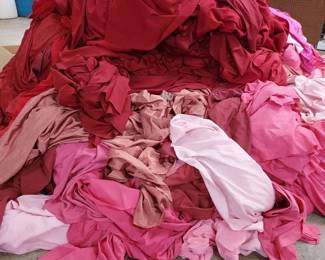 Huge Pile of Red Pink Unprocessed Table Linen