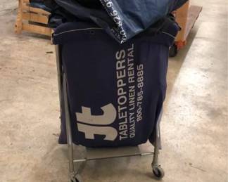 Rolling Industrial Laundry Hamper Filled with Laundry Bags