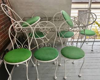 * 8 White Wrought Iron Ice Cream Parlor Chairs with Rectangular Wrought Iron Table with a Wooden Handmade Top $235 for the Set.                                                                                 
