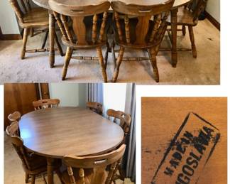 * Oval Dining Room Table w Drop Down Sides w 6 Chairs, made in Yugoslavia is 63 inches long with two leaves and 41 inches wide and 29 inches tall when Full Size. Small Rectangle when no leaves , sides dropped down. $150.        
