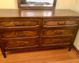 * Mid Century 6 Drawer Dresser with Mirror, measures 18 inches deep by 56 inches long 33 inches tall and the mirror is 29 inches wide & 45 inches tall. Has numbers 7110-20 62-H-61 stenciled on back of dresser. Also has Matching Pair of Cool Twin Beds Frame with Footboards & Headboards. Headboard measures 40 1/2 inches wide 2 inches deep and 39 inches tall. Top of dresser has minor scratches but front is in great condition. Bed Frames are in great condition. Beds are $100 Each, Dresser with Mirror is $150. All 3 pieces $300.    
