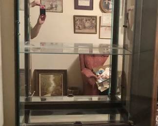 * Nice Wooden Glass Display Cabinet is 27 inches wide by 13 1/2 deep 79 inches tall, has an oriental look to it. $150 
