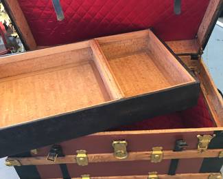 Refurbished steamers trunk inside and out.  Casters for easy movedment