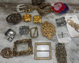 Pendants and belt buckles