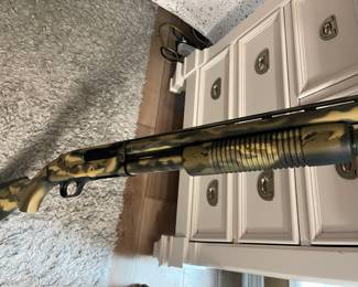 Mossberg 20 gauge shotgun, camo model 