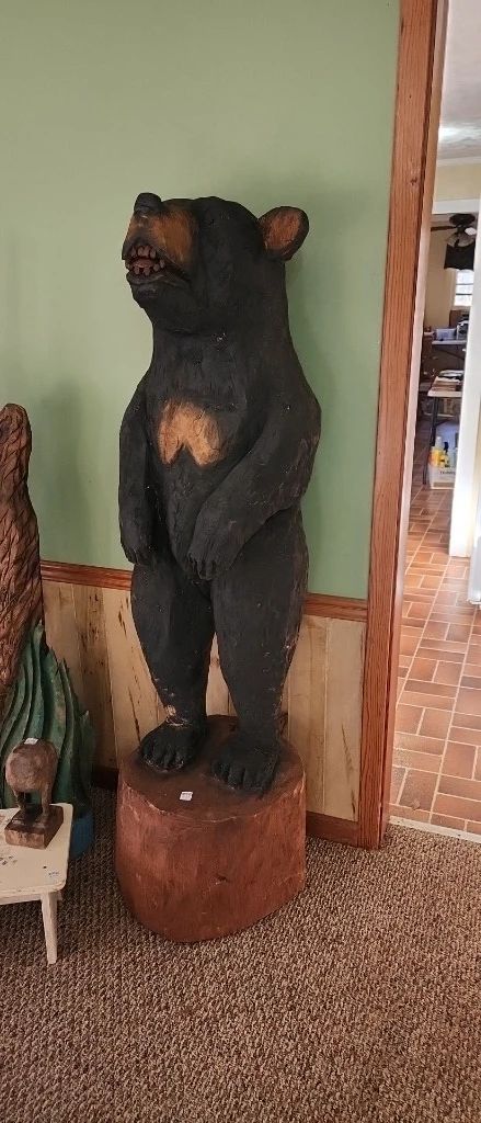 wood carved life sized black bear