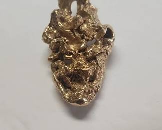 Gold (?) nugget pendant