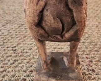 Head up his...., wood carved statue