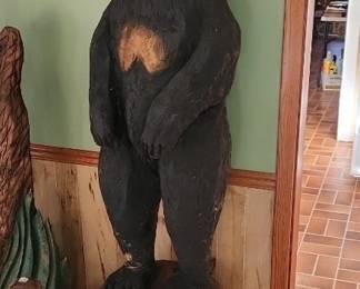 wood carved life sized black bear