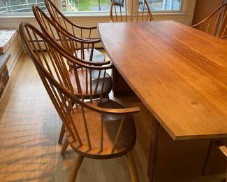 Side view of Moser Continuous Arm Chairs