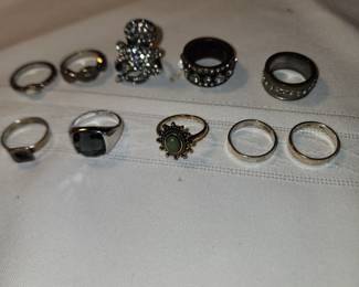 Rings, a couple silver and a cute octopus ring