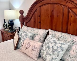 King sized bed (mattress, bedding, and frame all for sale separately)