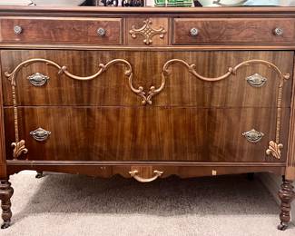 Beautiful wood dresser and mirror with accent designs