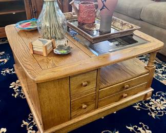 Wood coffee table with storage drawers 
