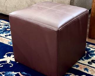 Small leather ottoman