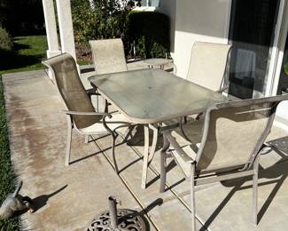 patio table with 4 chairs, umbrella stand 