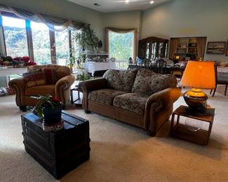 Loveseat, arm chair, vintage trunk, livingroom area