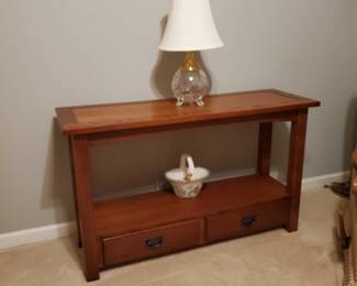 This sofa table is approximately 4'