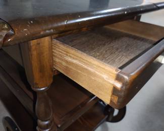 Tea cart drawer has dovetail construction 