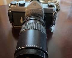 Camera With Zoom Lens