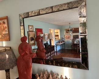Luis Guzman Reyes (Santiago, Chile) clay sculpture , signed "GUZMAN" at base. $1,800; Vintage Hollywood Regency 40" x 50"  rectangular beveled wall mirror with smokey glass and gold veined border.$750.