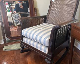 cane back rocker , dresser mirror 