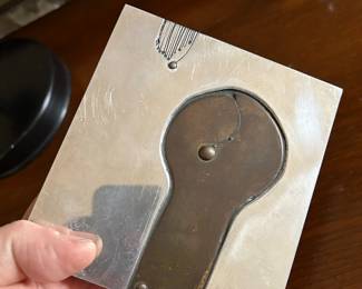 "Now Look Here" 5 x 5 3/8"Metal relief sculpture/ wall hanging by Charles Pebworth (Houston, TX. 1926 - 2019) signed and titled on on verso, $100.