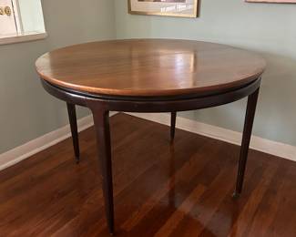 Landstrom (Rockford, Ill.) vintage hybrid MCM / Hollywood regency round dining table with two leaves on casters (26 x 40" round without leaves, each leaf measures 15")
