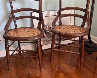 Pair vintage French country cane side chairs