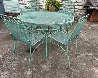 Vintage wrought iron patio table and 4 chairs 