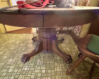 round oak table with claw feet