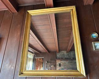 large gold framed mirror