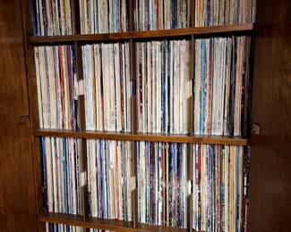 Many 33rpm and 45rpm records . Excellent shape 