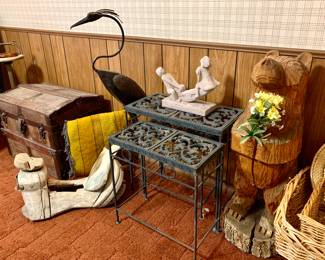 Wrought iron nesting tables. Wood chainsaw carved Bear. Antique Trunk made by A.E.Meek in Denver Co. Antique saddle frame. Metal Crane. Great baskets of all sizes