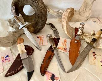Santa Fe Stoneworks- Demask with bone handle. MER German steel with carved antler handle. Skinning blade knives. Not pictured WWII USM4 PAL bayonet with sheath. Swiss Army and so many more. in picture Rams Horns, jaw bone