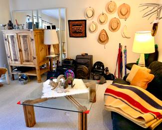 Straw Hats. Glass top coffee table