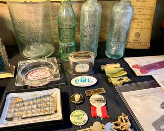 Bottles from left to right:
- McCary Mineral Water from Birmingham 
- Dixie Cola from Birmingham 
- National Dope Co. from Birmingham $50
- Alabama Bottling Co. $20