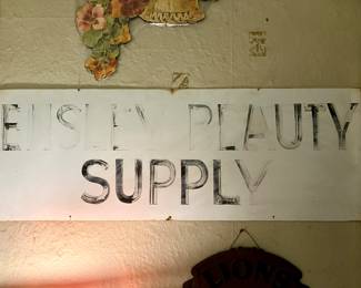 Hand painted Ensley Beauty Supply metal sign
